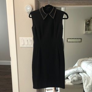Calvin Klein nice classic fitted dress for work. Runs slightly large.
